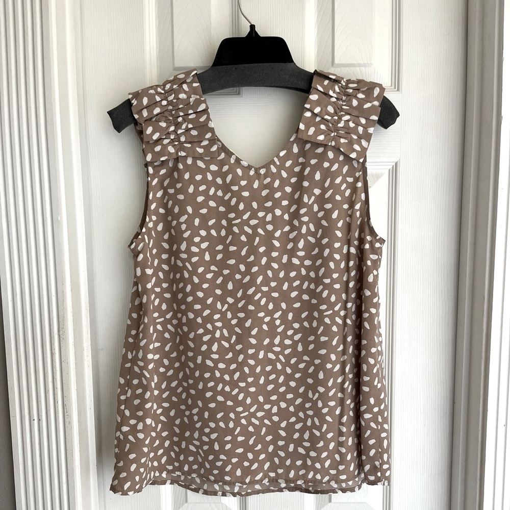 “Entro” brand blouse.